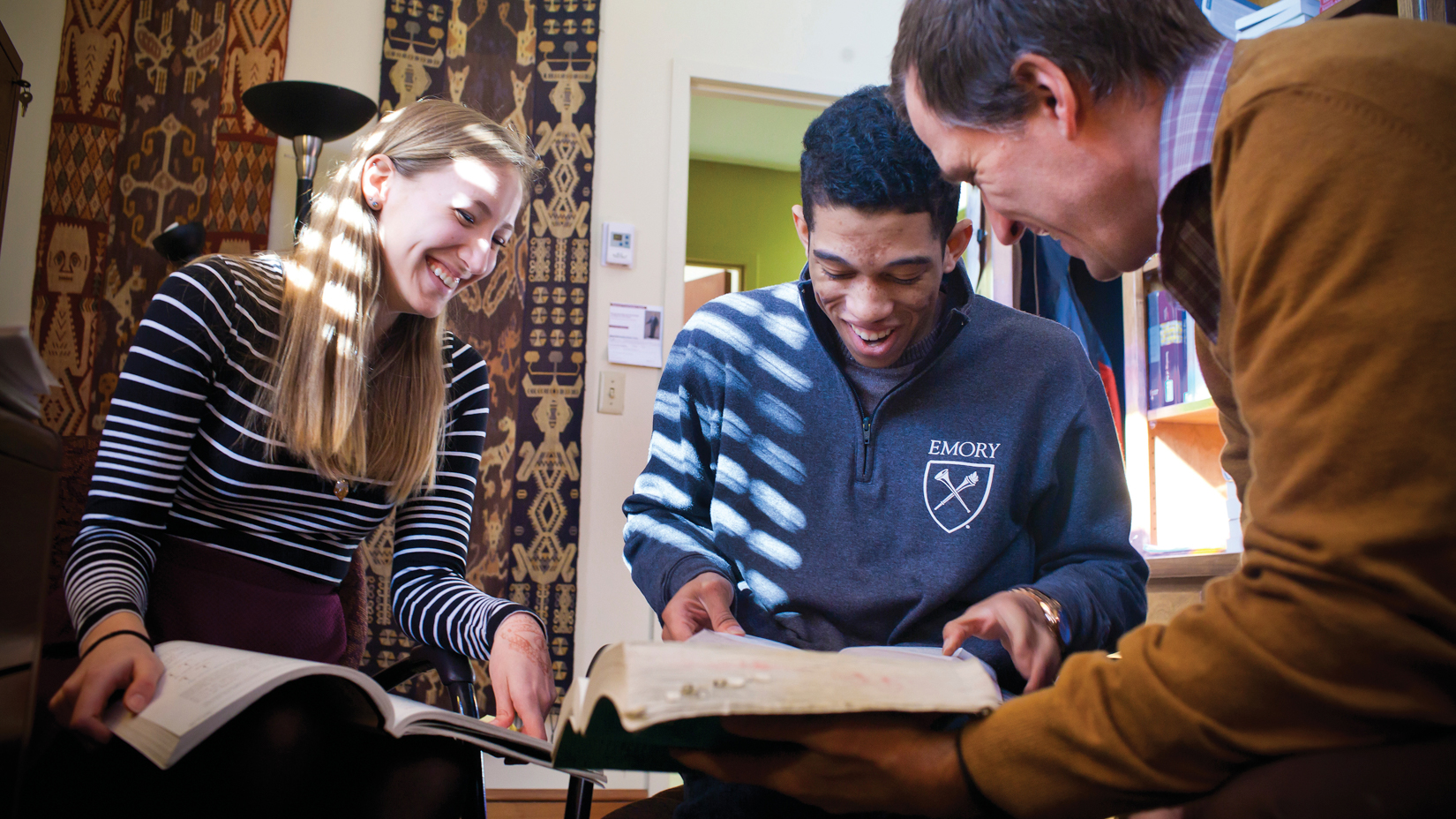 Oxford faculty member with students.