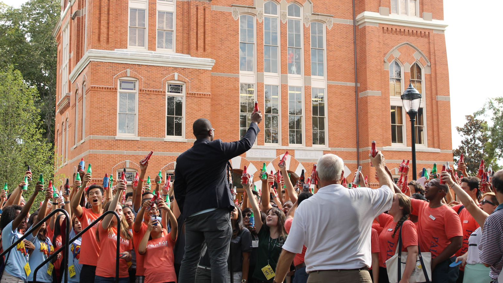Interim Dean Kenneth Carter joins student leaders at the annual Coke toast.