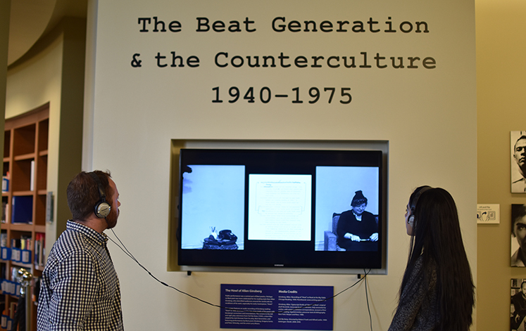 The Beat Generation exhibit at the Oxford Library encourages listening and touching exhibit materials.