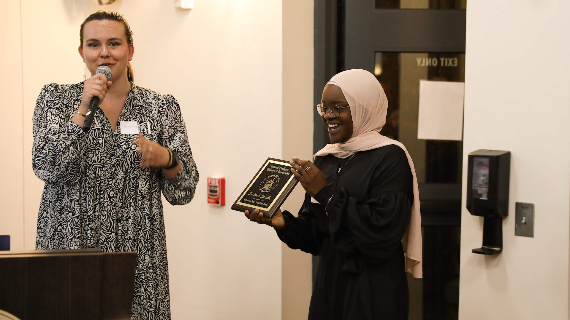 MSA co-president Zainab Salako receives her "outstanding student" award at the gala.