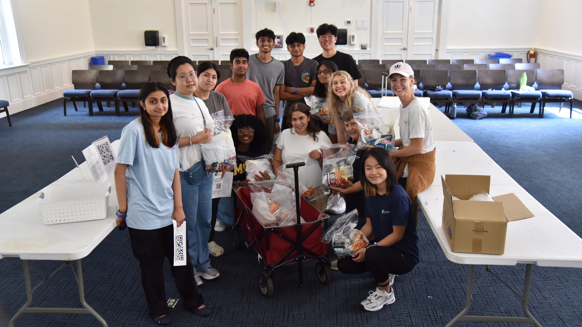 students after packing food kits for Giving Hands Food Pantry