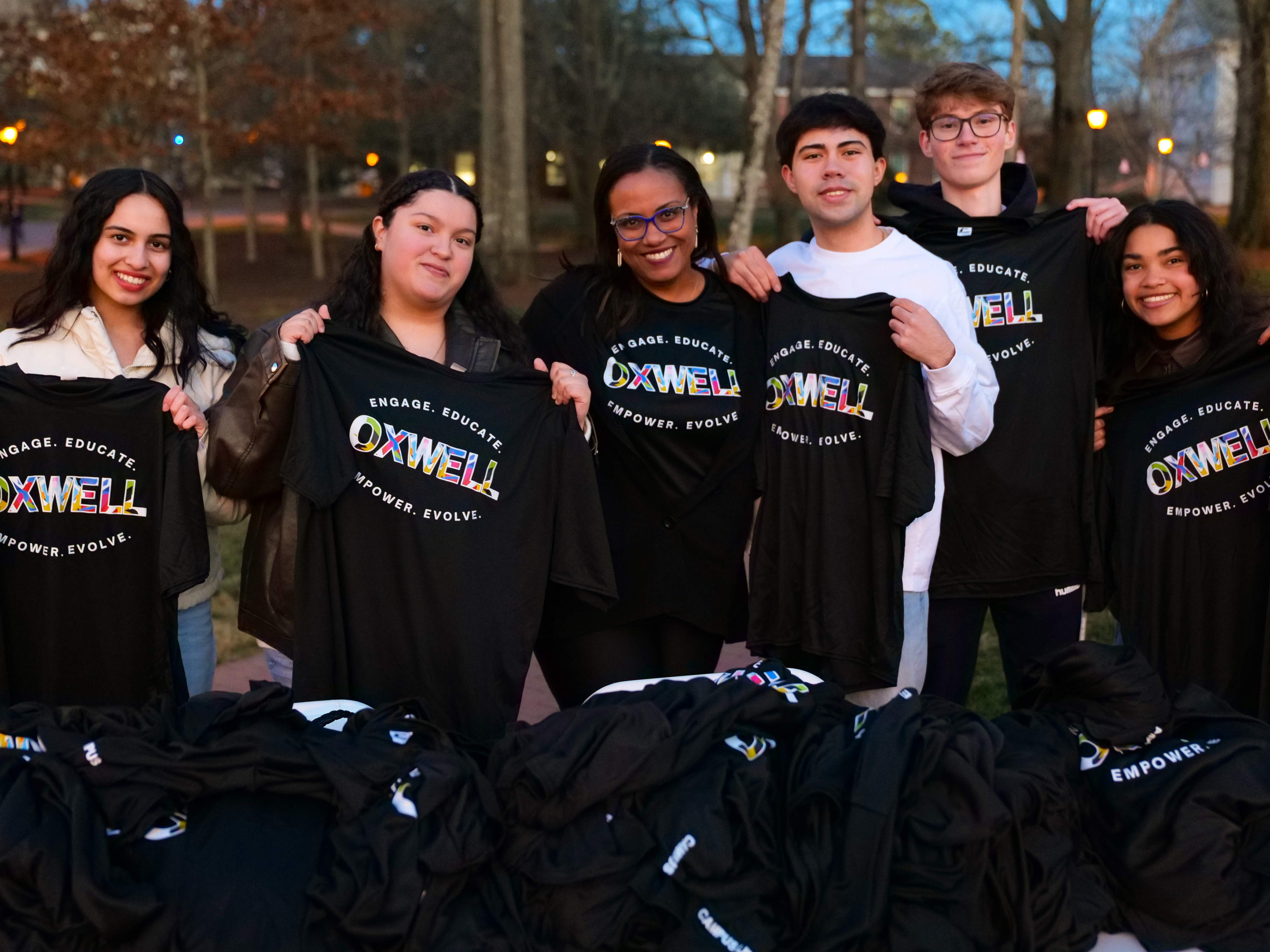 Senior Associate Dean of Campus Life Darleny Cepin with Oxford students attending the OxWell Expo.