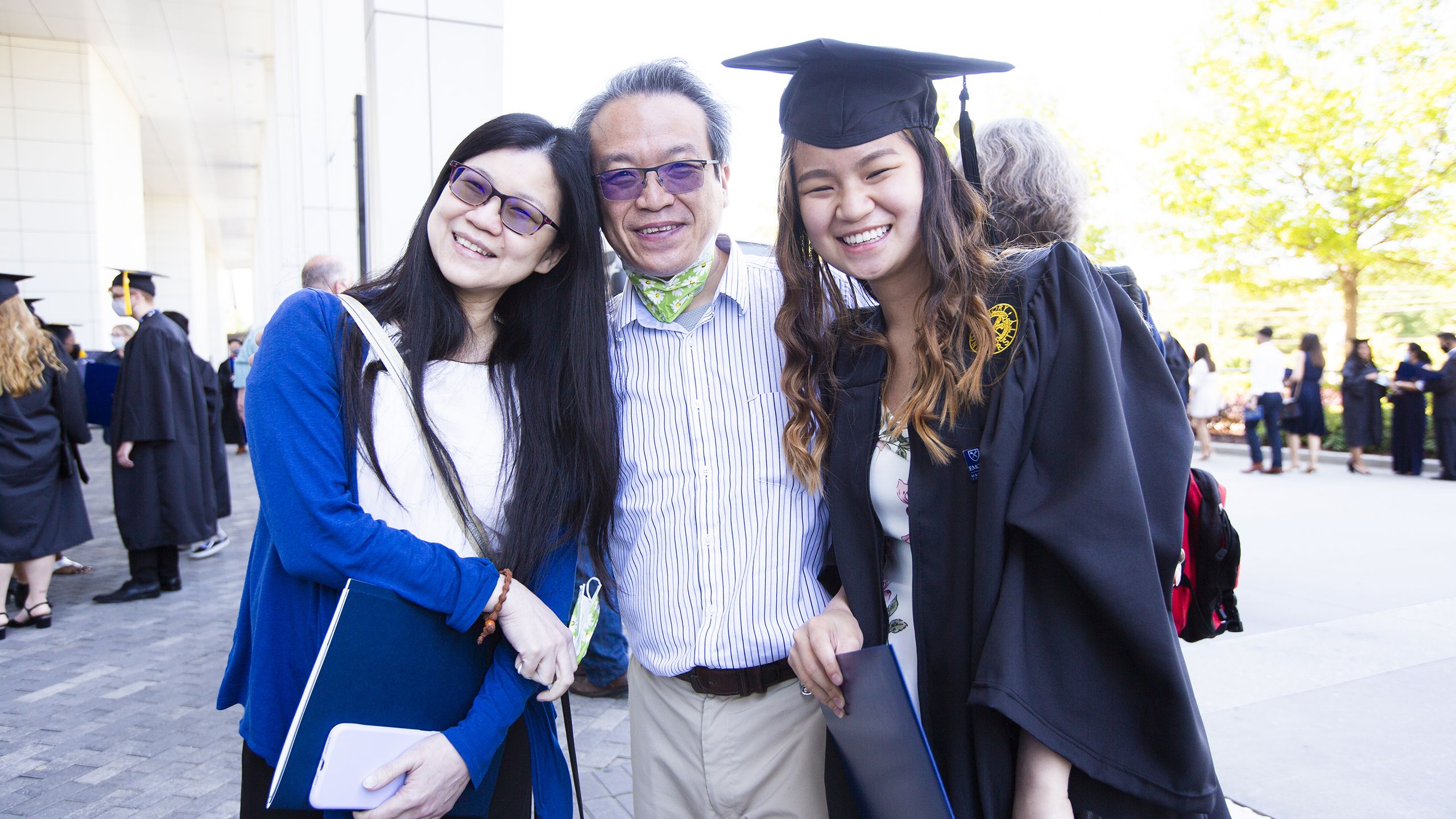 A graduate with her family outside the Georgia World Congress Center.