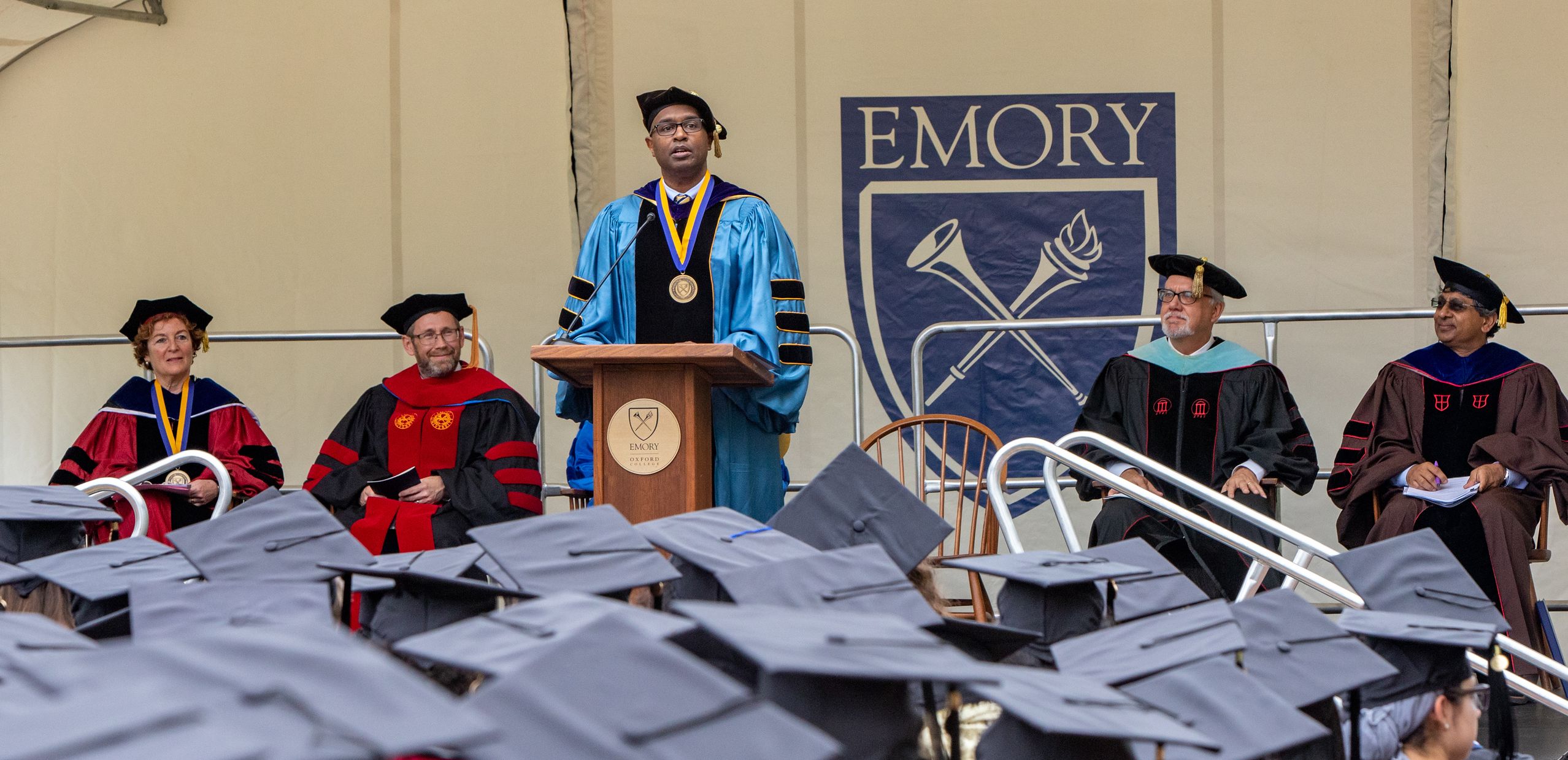 Interim Dean Ken Carter speaking during the commencement ceremony.