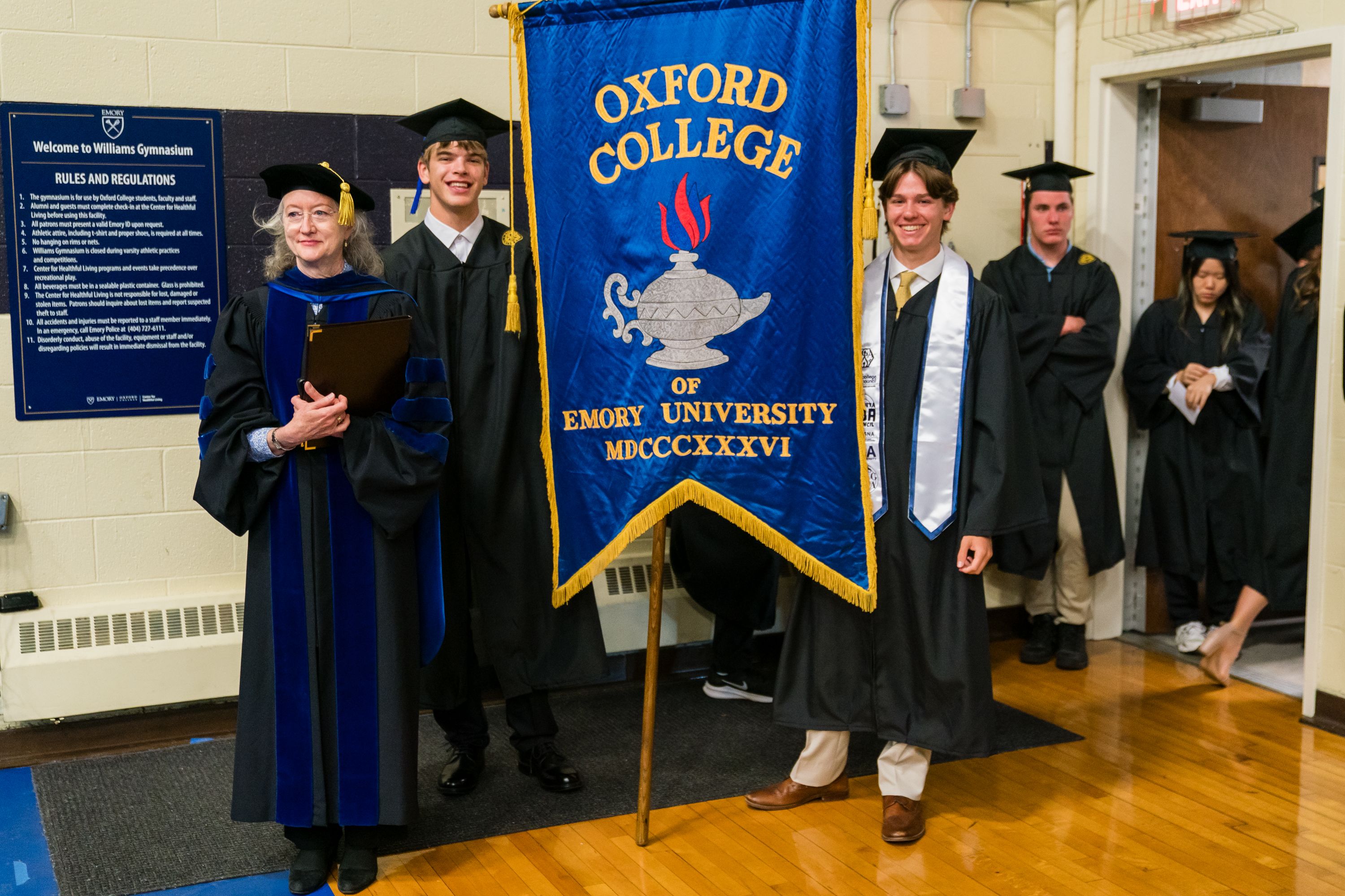 Dr. Susan Ashmore, professor of history with Oxford students celebrating commencement.