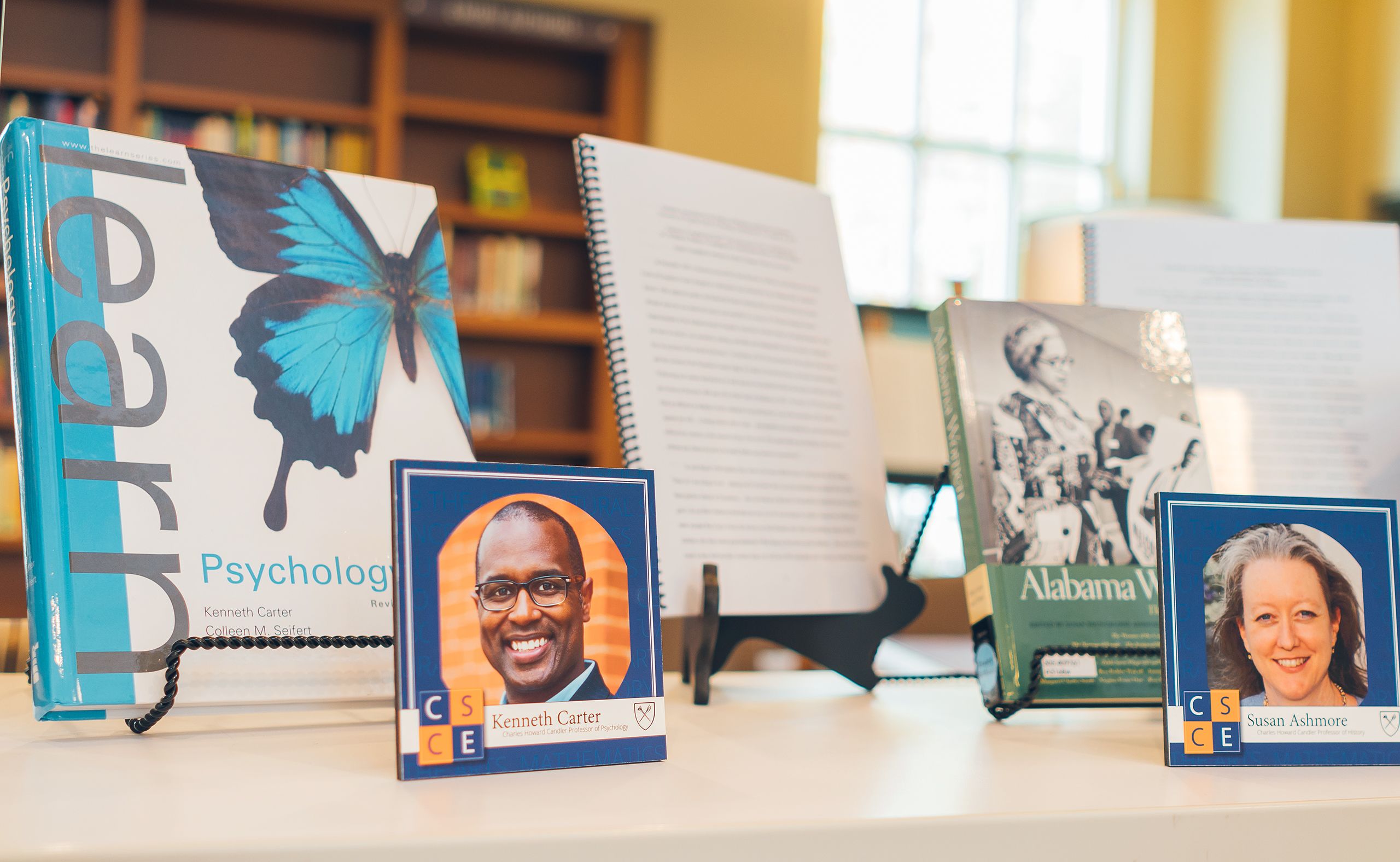 Ken Carter, Professor of Psychology, and Susan Ashmore, Professor of History, exhibits their latest books.
