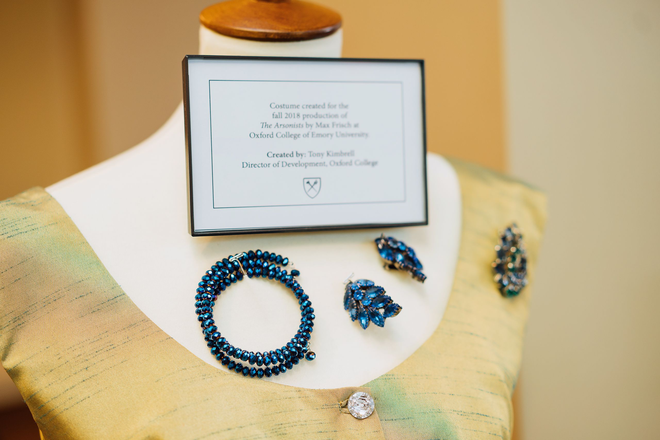 The showcase includes published books, journal articles, art, and presentations highlighting language, literature, math, social history, religion, and other research. It also features podcasts and theatrical costumes.