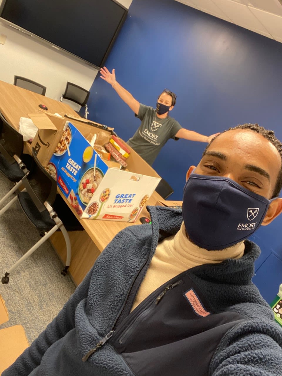 Ricardo Horne helps package food.