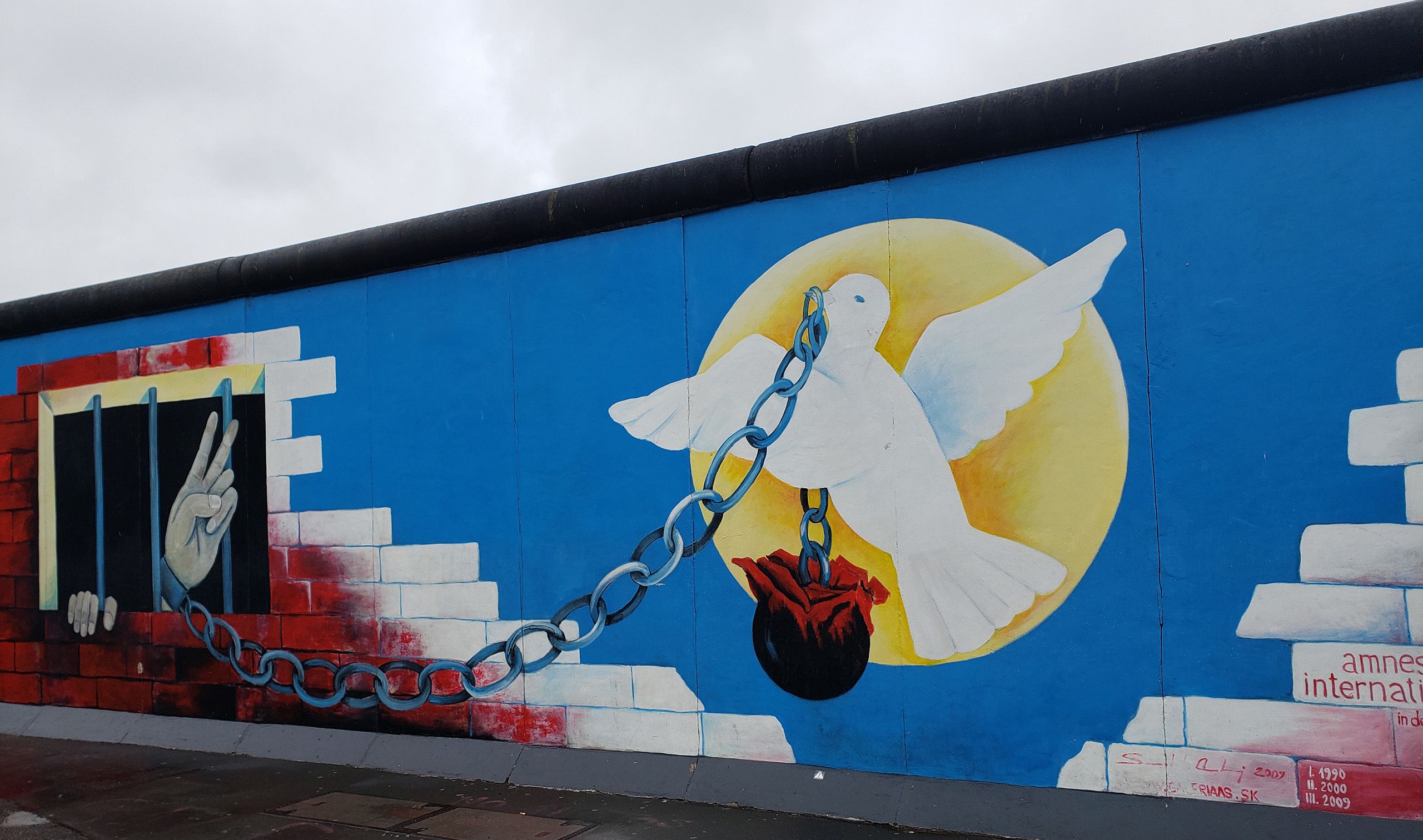 A mural painted directly on a remnant of the Berlin Wall.