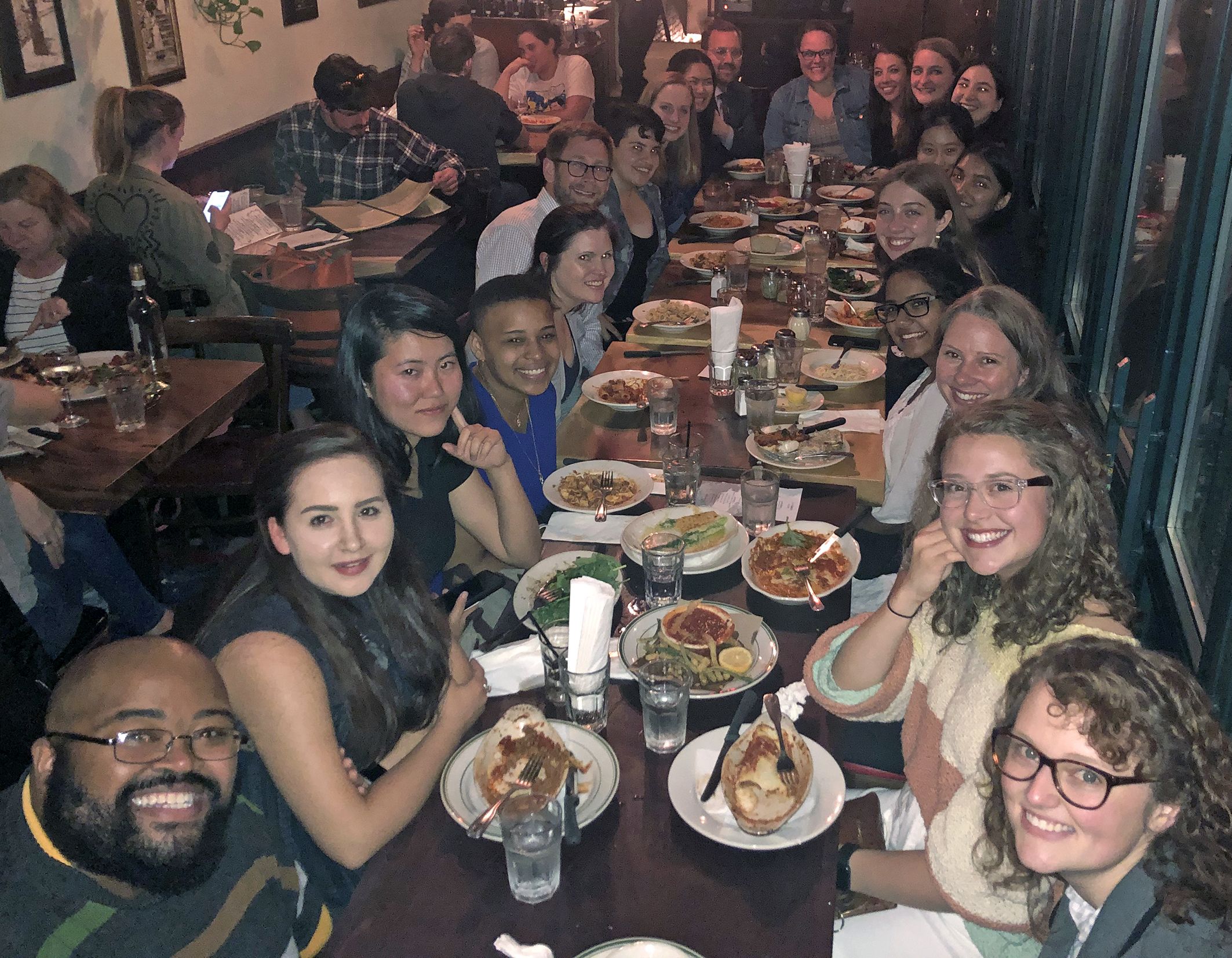 Students enjoy a meal while dining out in New York City.