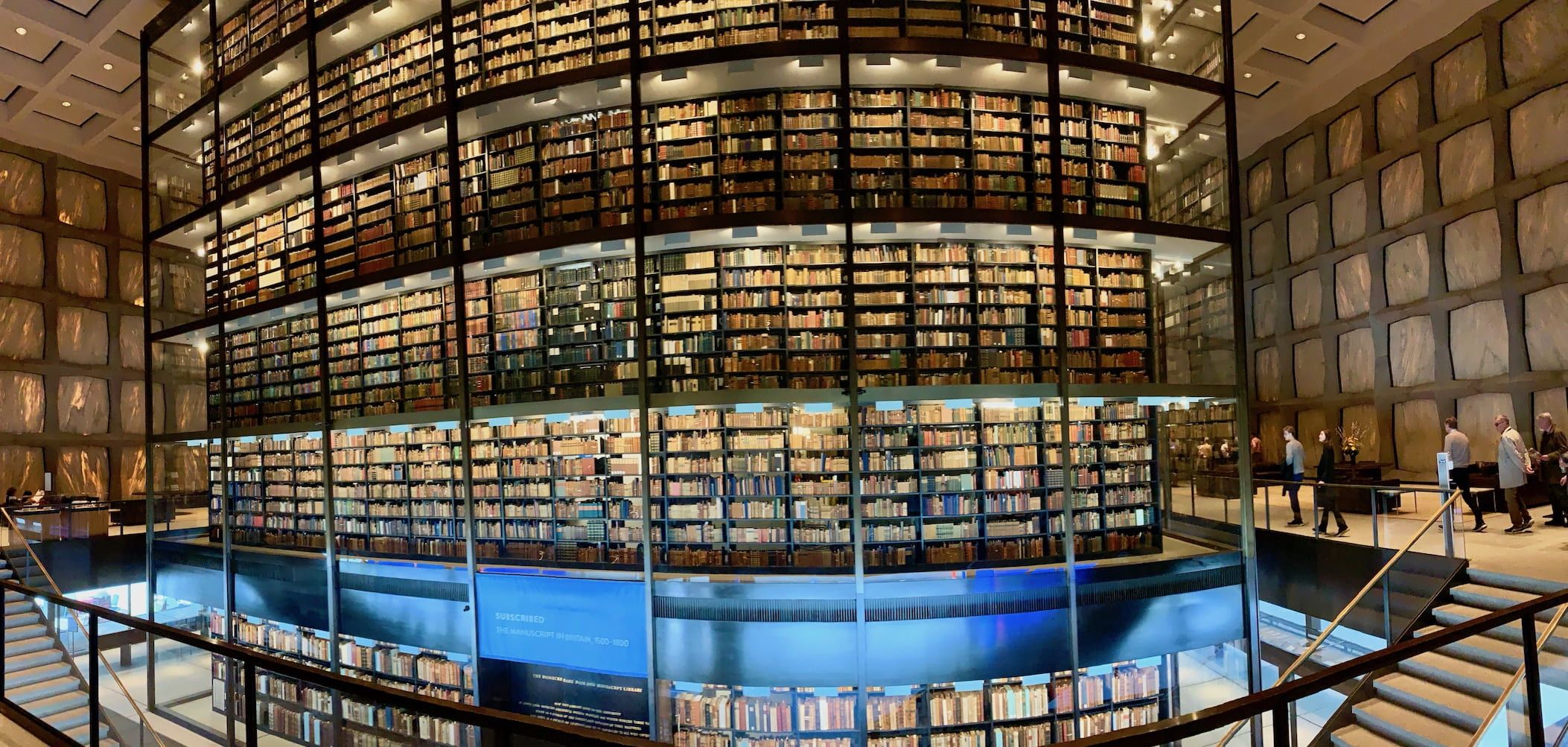 The six-story, glass-enclosed tower of more than 180,000 rare books, which towers over the reading room where Ruan and Higinbotham worked.