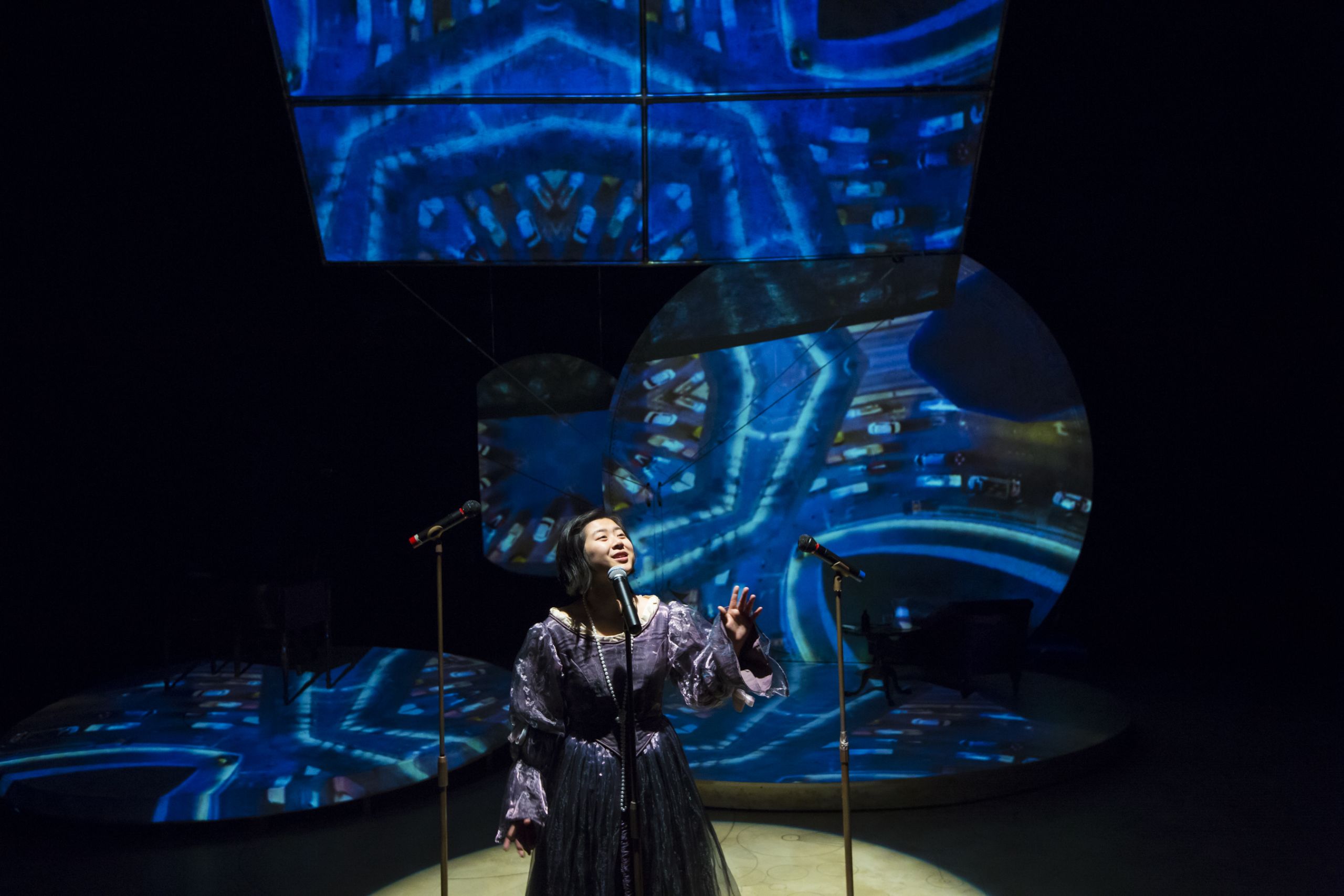 Ada programs a musical theatrical at the play's end.
